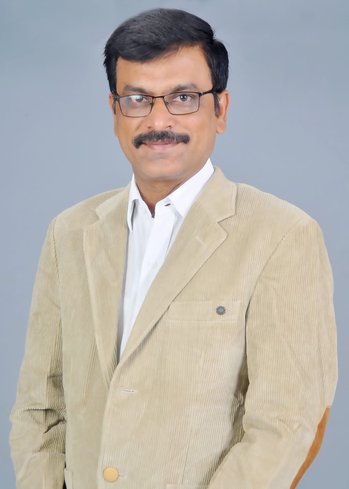 Professional insurance advisor in formal attire posing confidently